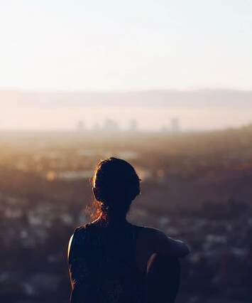 Woman on a cliff - image for Listening collection